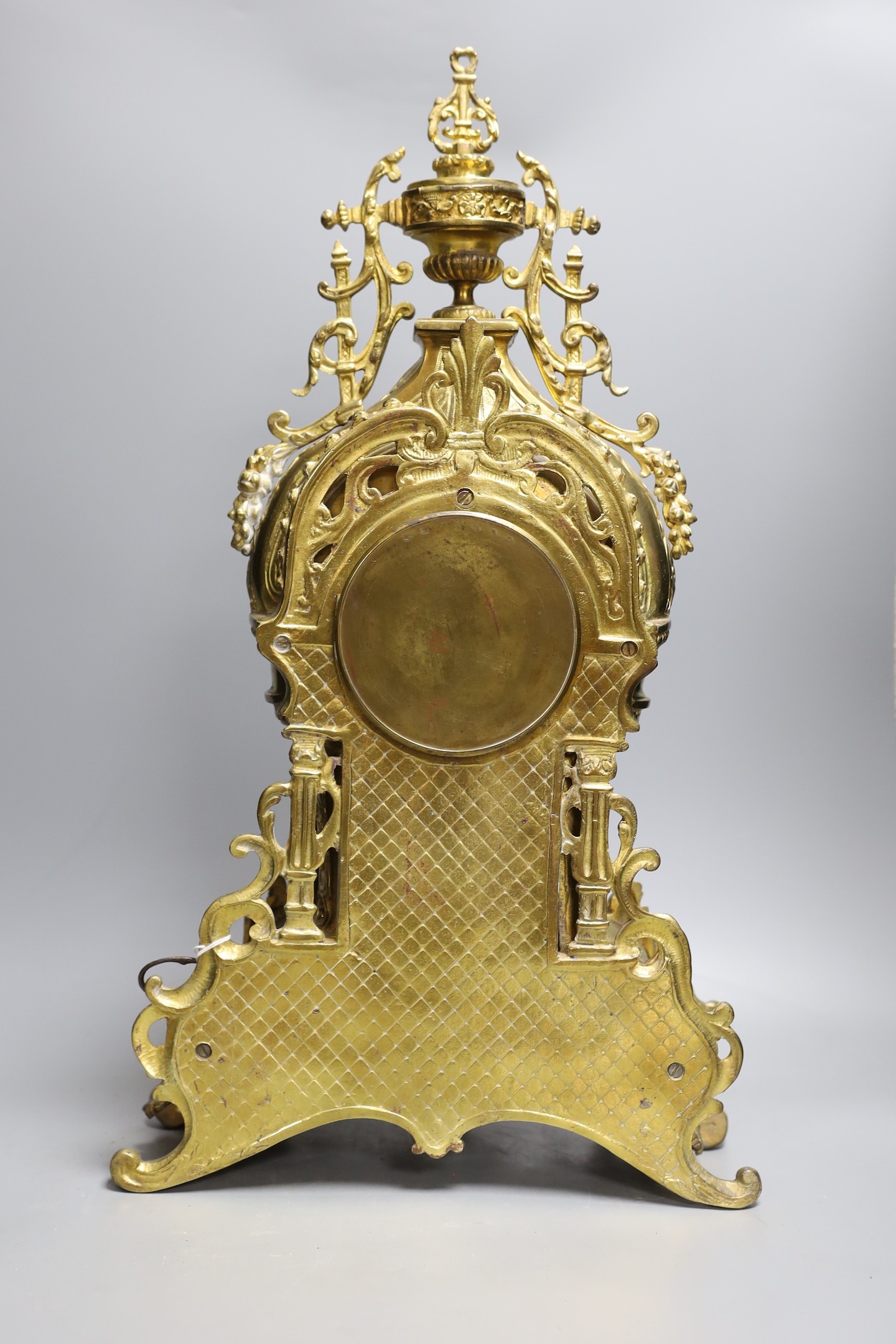 A large decorative French gilded bronze 19th century clock garniture - 56cm tall